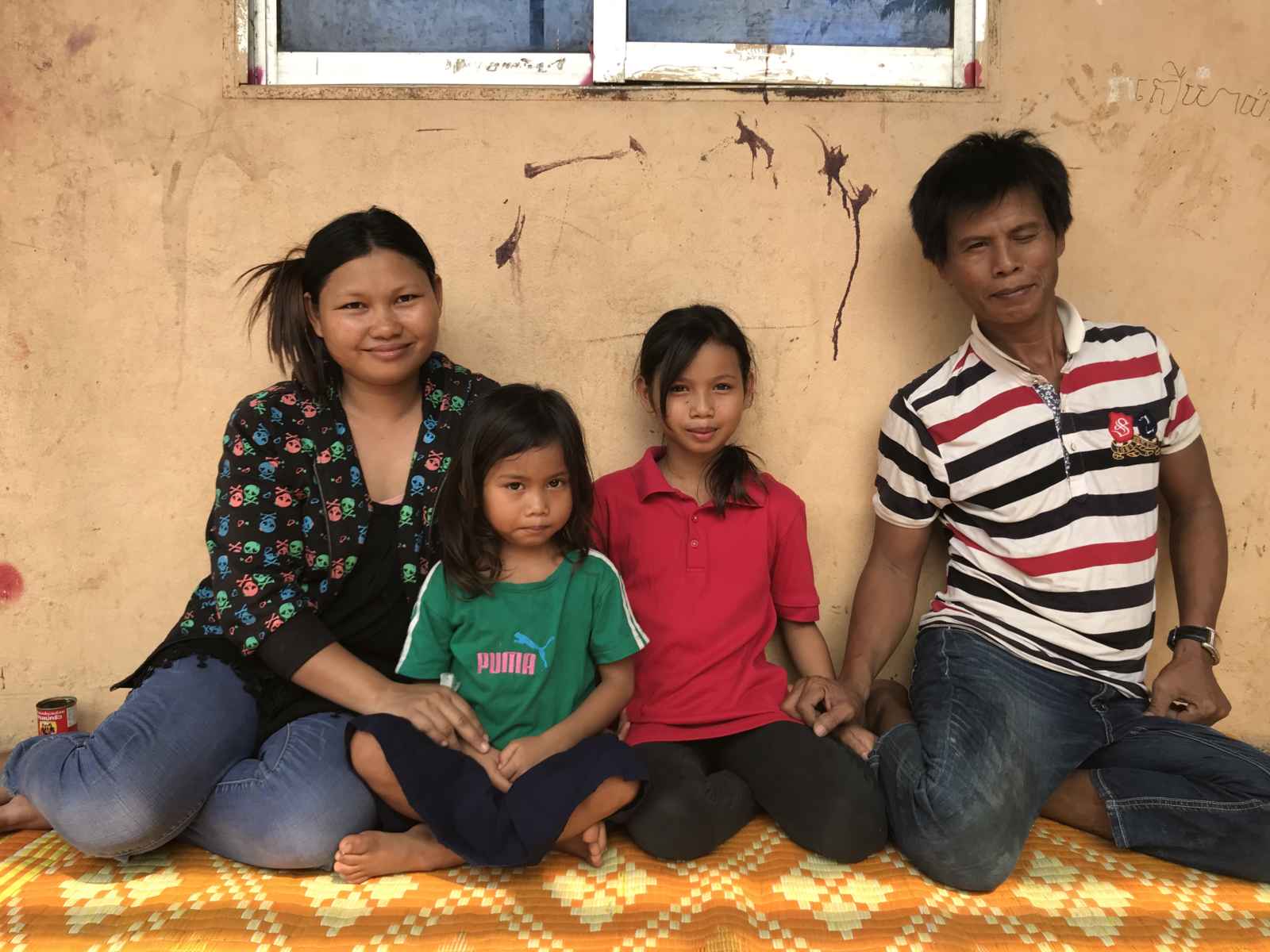 Cambodians Heab and Reron with their 2 daughters