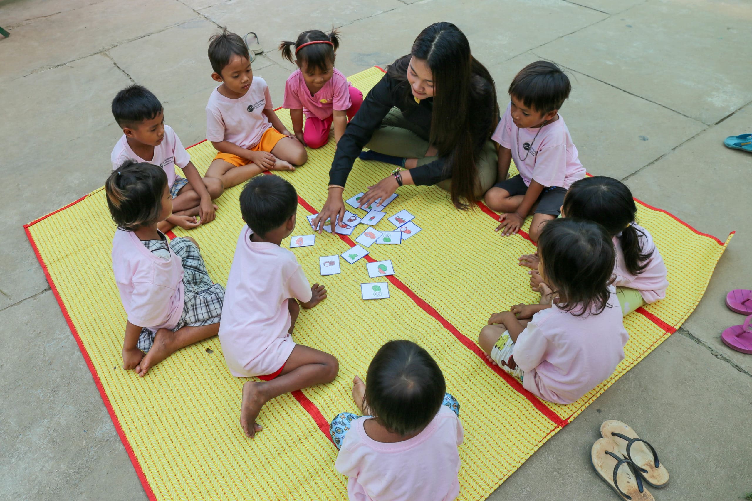 Students with their teacher at a CCT pre-school
